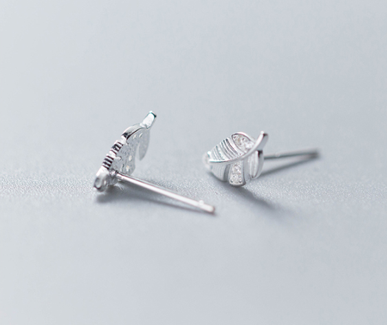 Color: Silver - Female Fashion Temperament Diamond Feather Stud Earrings Personality Sweet Leaves