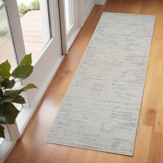 2' X 5' Gray and Beige Geometric Distressed Area Rug